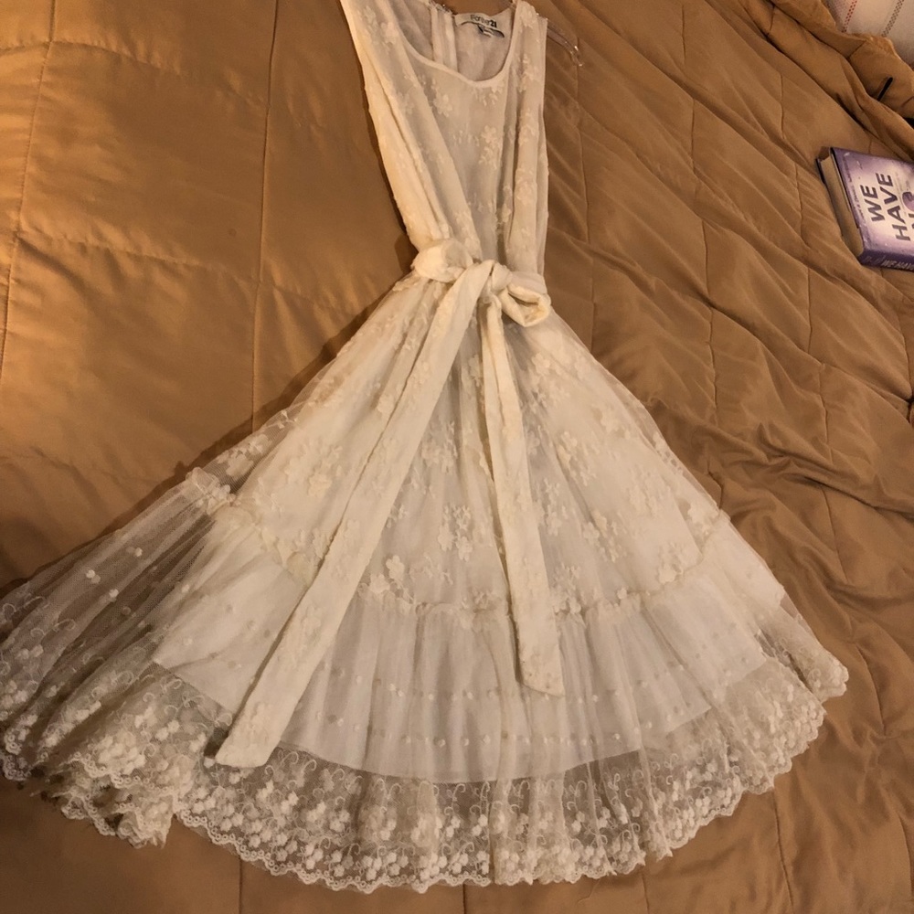 Beautiful white net pattern dress.